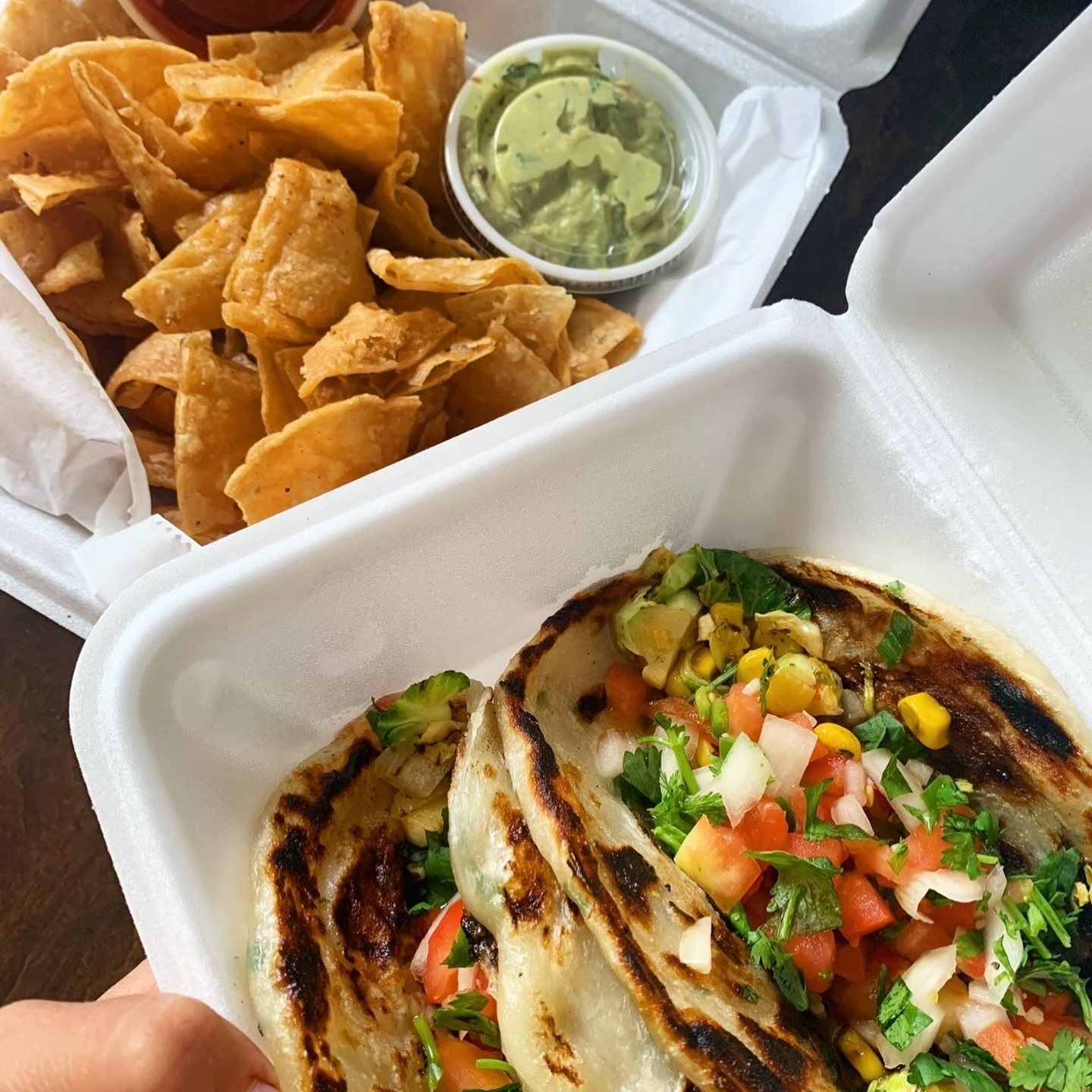 Tacos with chips and guacamole