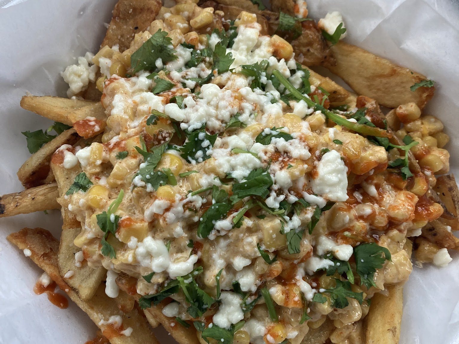 Loco fries with cotija and cilantro
