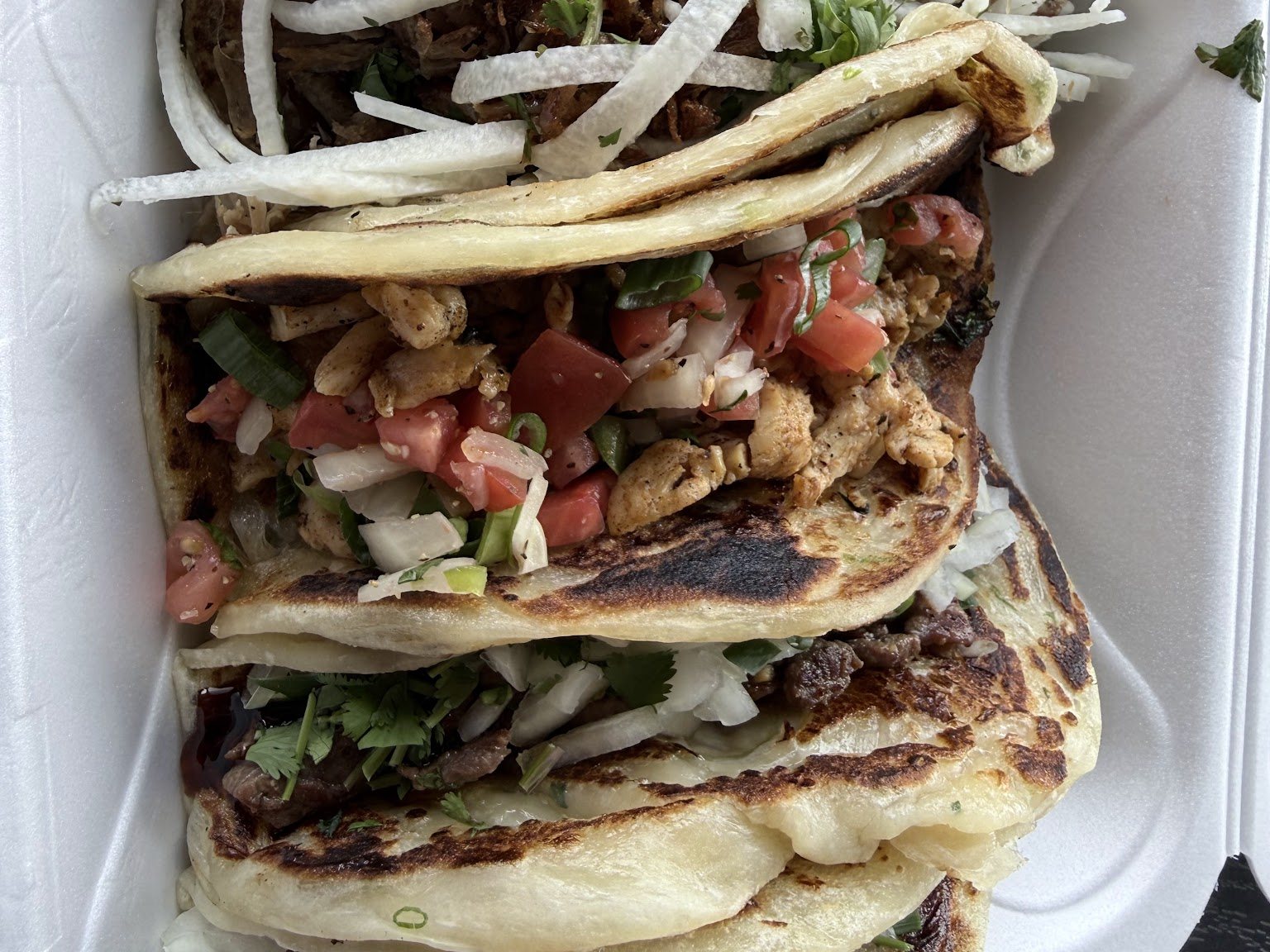 Three loaded street tacos